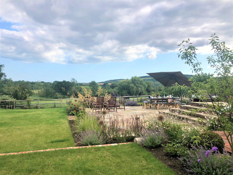 Lawn on two levels with brick steps